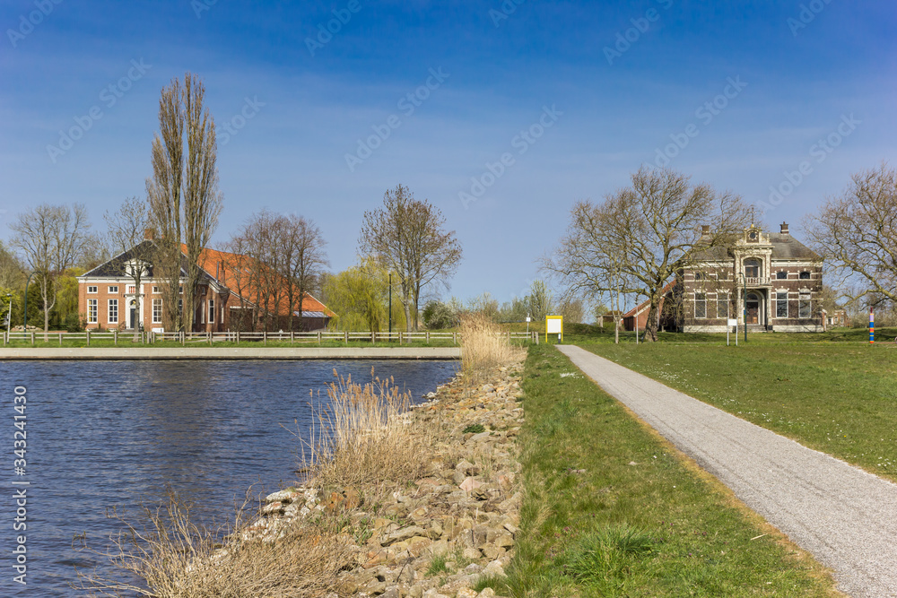 Historic houses at the Oldambtmeer lake in Oostwold, Netherlands