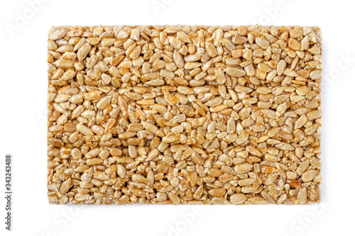 Sunflower seeds in caramel Isolated on white background