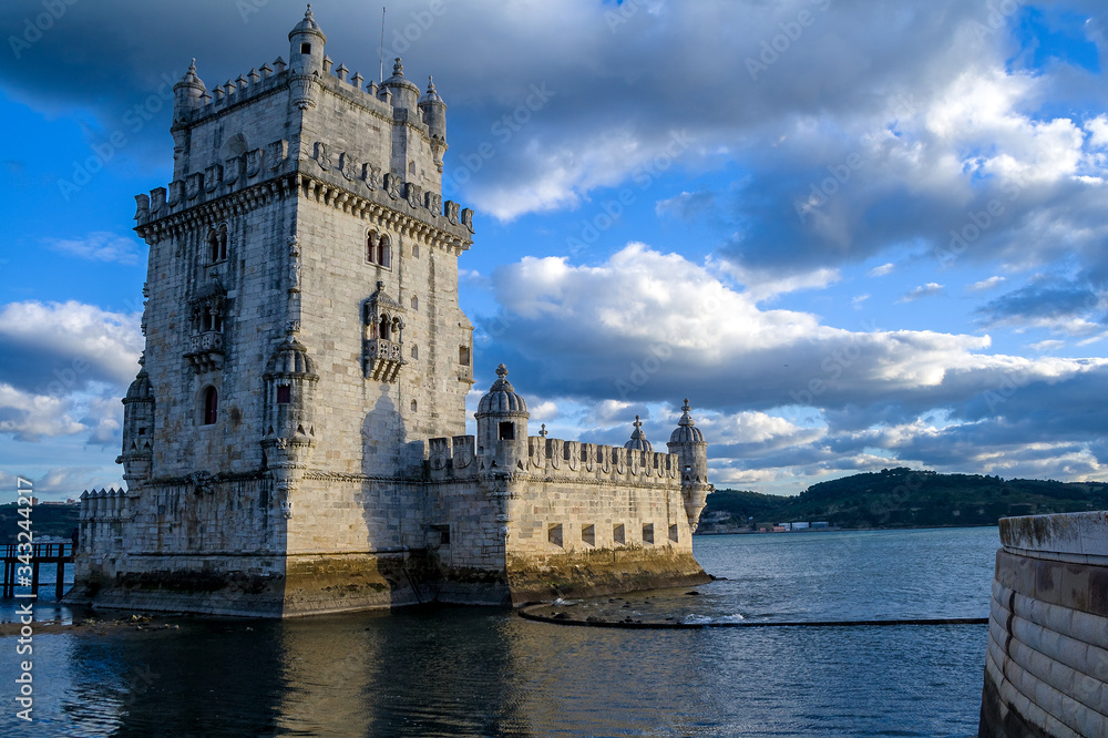 Lisbon, Belem Tower - Tagus River, Portugal. Architecture with bright blue sky