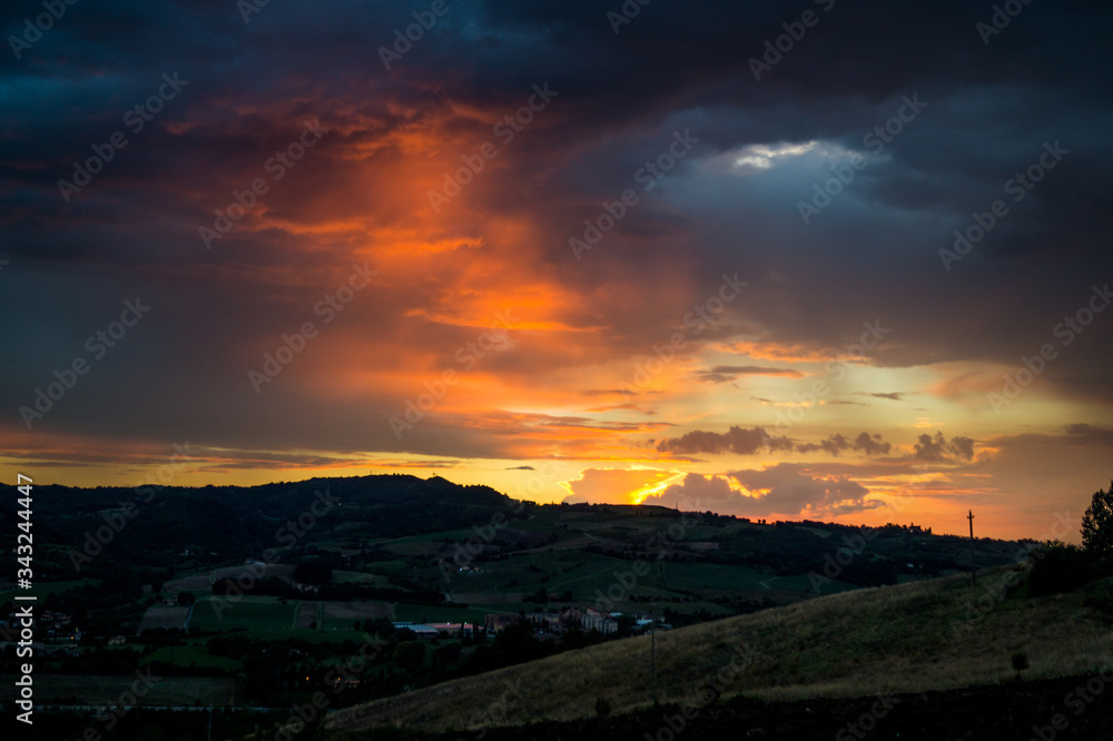 Sunset over the city hills of Bologna, Italy, after a strorm