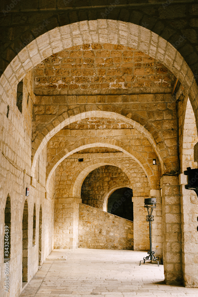 Fort Lovrienac inside. Ancient stone arched corridor in Lovrienac fortress in Dubrovnik