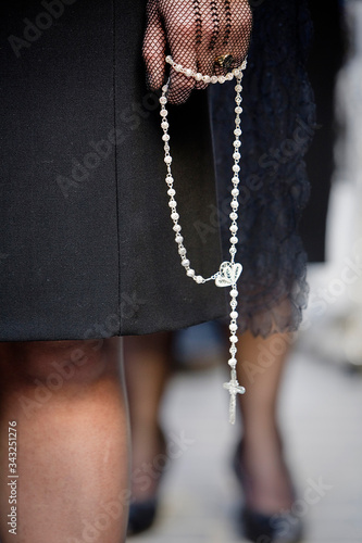 Woman dressed in mantilla during a procession of holy week, Spain photo