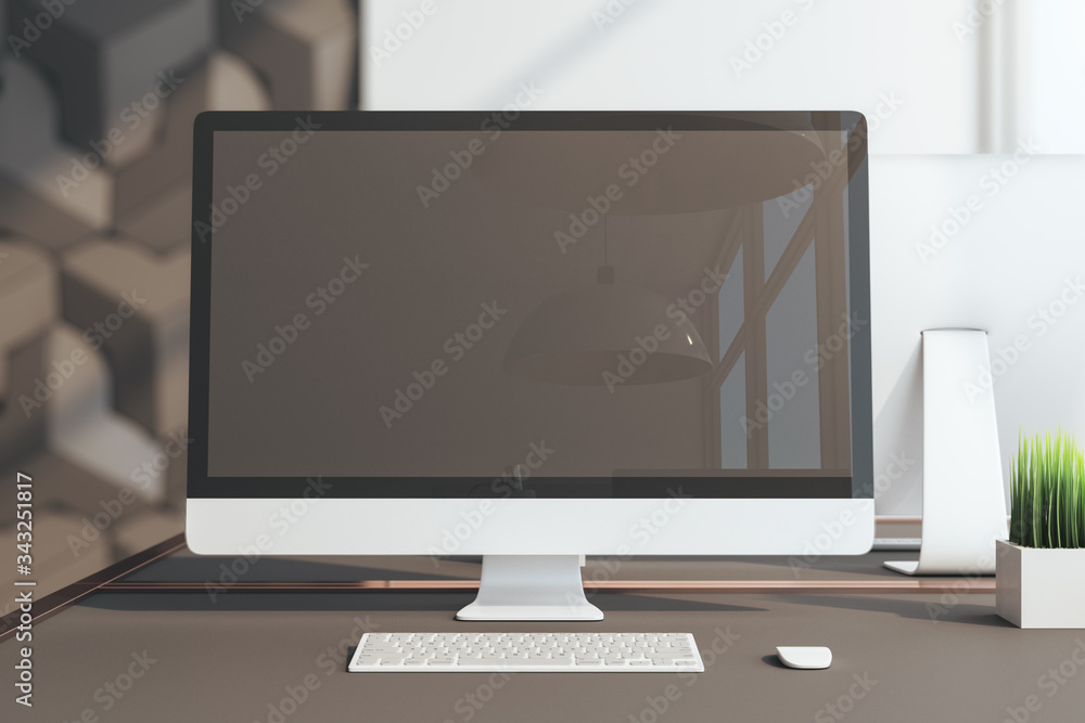 Contemporary office workplace and computer with blank screen Contemporary office workplace and computer with blank screen
