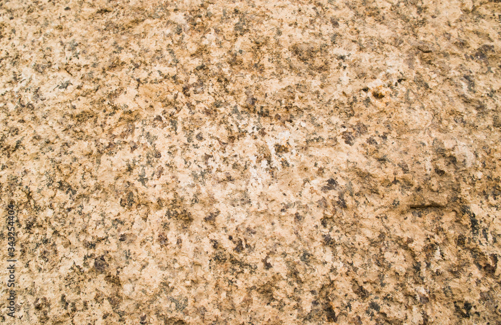 The texture of a red stone. Black dots and irregular white red patterns. Beautiful background. Abstraction. The texture of a red stone. Black dots and irregular white red patterns. Beautiful background. Abstraction.
