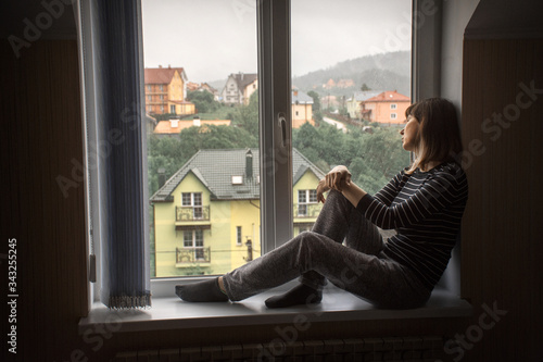 girl alone at home isolated