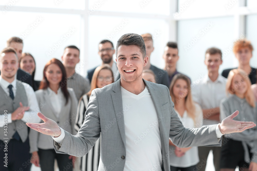 confident Manager standing at the front of the business team confident Manager standing at the front of the business team