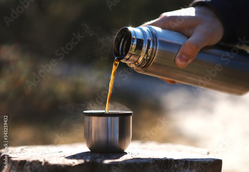 pouring coffee into a cup