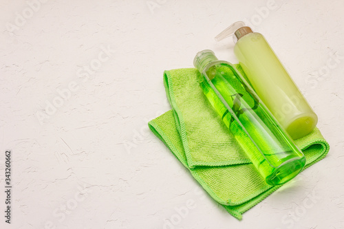 Personal care at home. Gel and tonic water with green tea  bath towel. Natural ingredient spa concept