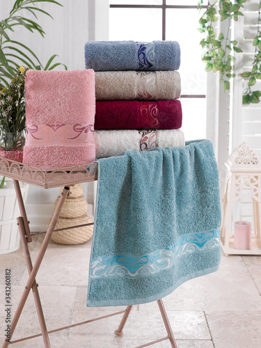 Stack of clean soft colorful towels. 