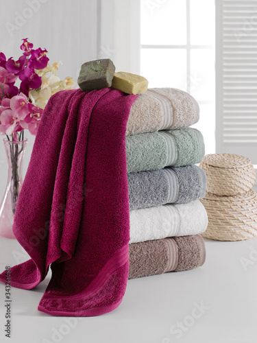 Stack of clean soft colorful towels. 