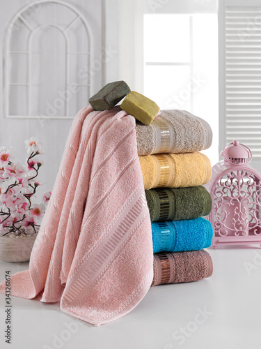 Stack of clean soft colorful towels. 