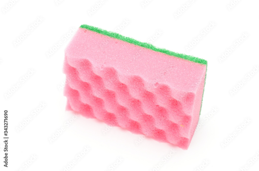 Sponge for washing dishes and plumbing on a white background Sponge for washing dishes and plumbing on a white background