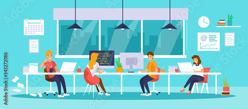 People work together in office or coworking space. Men and women sitting at the desk with computers