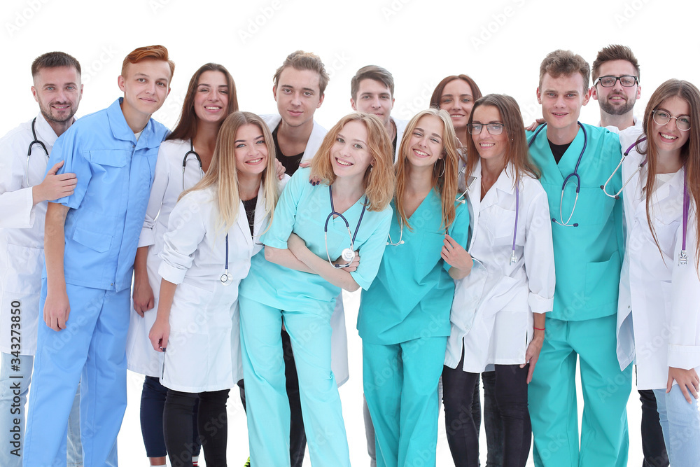 top view. a group of smiling doctors pointing at you. top view. a group of smiling doctors pointing at you.
