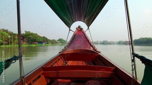 Cruising in a Long-tail boat on the Chao Phraya River to Ayutthaya, Thailand - 21 January 2020 photo