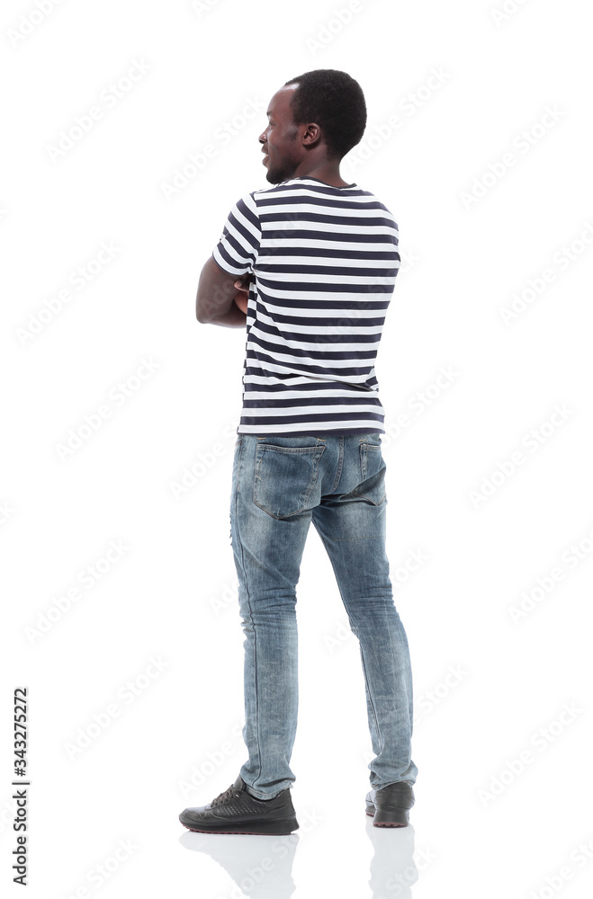 smiling young man in a striped t-shirt . isolated smiling young man in a striped t-shirt . isolated
