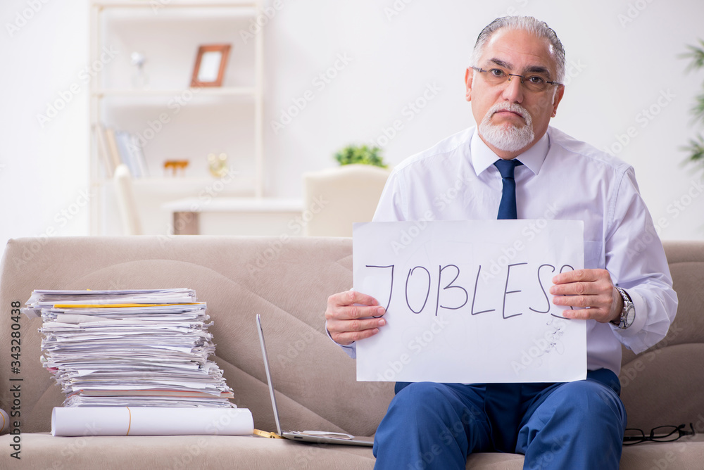 Aged businessman employee working from house Aged businessman employee working from house