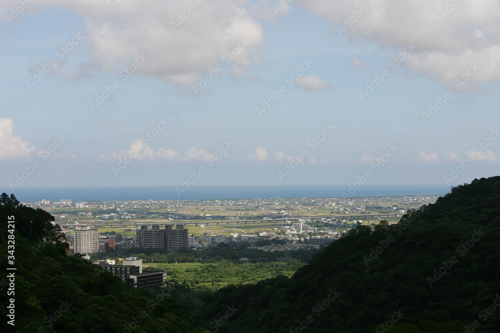 Sunny high angle view of the Yilan plain landscape from Catholic Sanctuary of Our Lady of Wufengqi