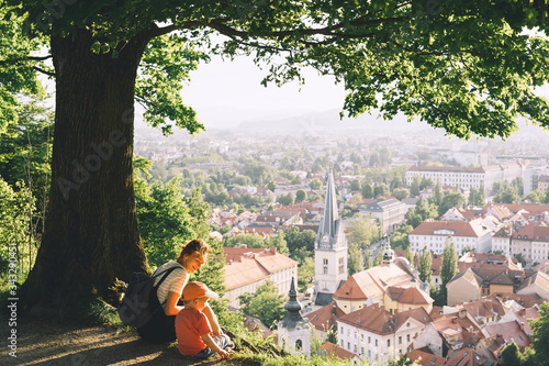 Family look at panorama of Ljubljana, Slovenia, Europe.