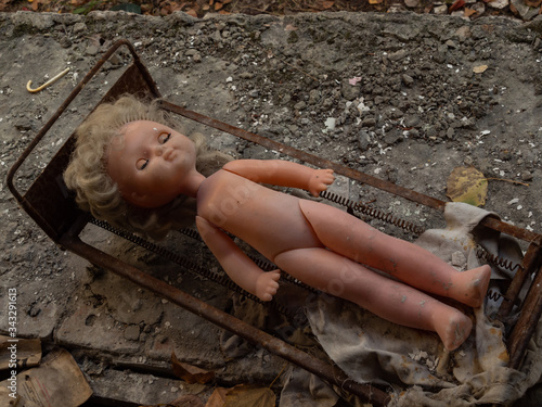 A doll in an abandoned kindergarten building after the explosion of the reactor in Chernobyl. Pripyat Ukraine