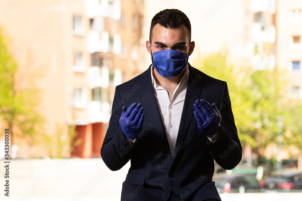 Man Is Praying Wearing Protective Mask and Gloves Man Is Praying Wearing Protective Mask and Gloves