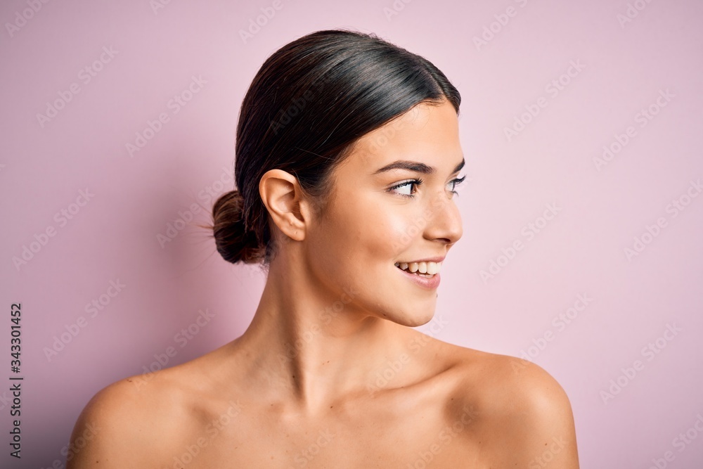 Close up of young beautiful woman with clear and pure skin. Perfect and clean skincare wearing natural makeup. Smiling happy looking fresh and healthy. Close up of young beautiful woman with clear and pure skin. Perfect and clean skincare wearing natural makeup. Smiling happy looking fresh and healthy.