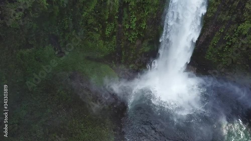 Untouched Nature of Chile, Aerial View of Waterfall Deep in Rainforest of Tolhuaca Nationa Park photo