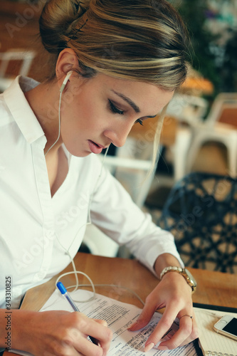 business and people concept: Business woman signing a contract