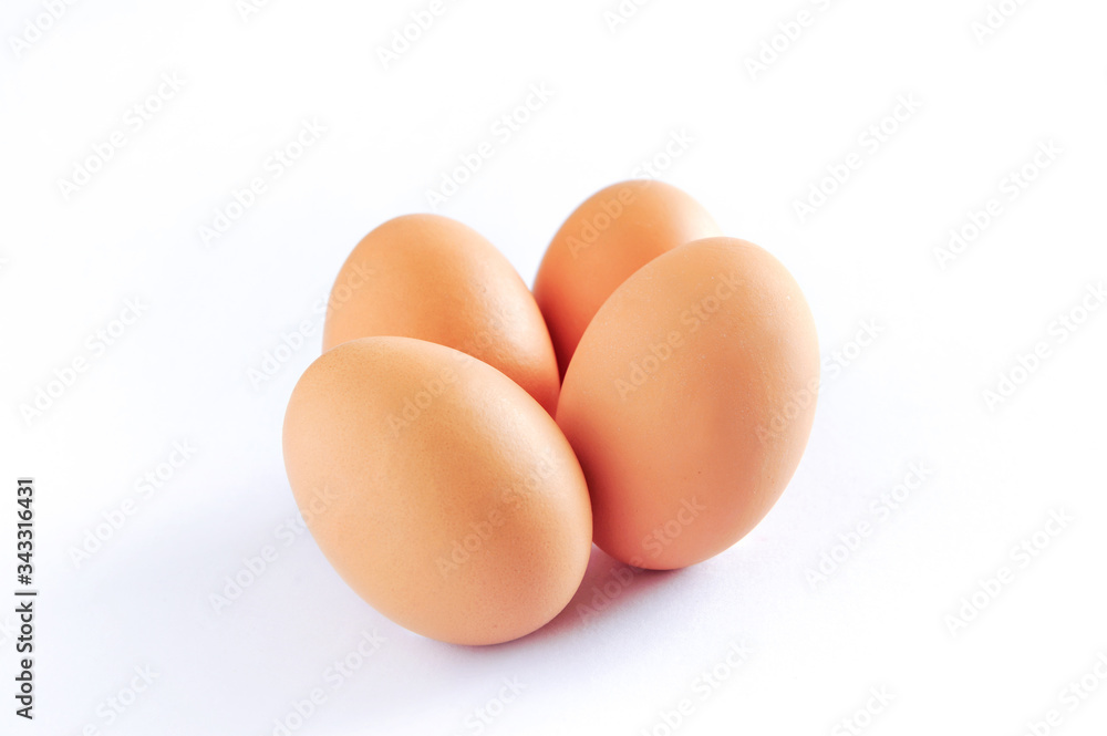 Four brown chicken egg isolated on white background Four brown chicken egg isolated on white background