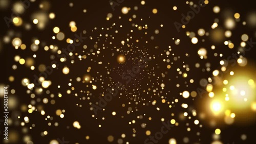 Abstract gold glitter and particle on black background. Looped animation with beautiful golden bokeh. photo