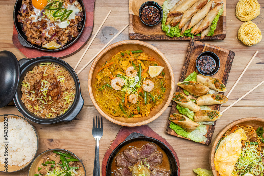 Still life with dishes of ramen and Korean food Still life with dishes of ramen and Korean food