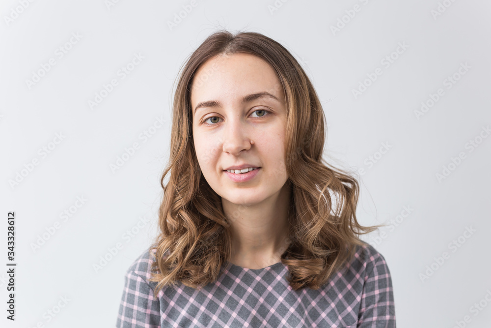 Face of a beautiful young girl with a clean fresh face close up.