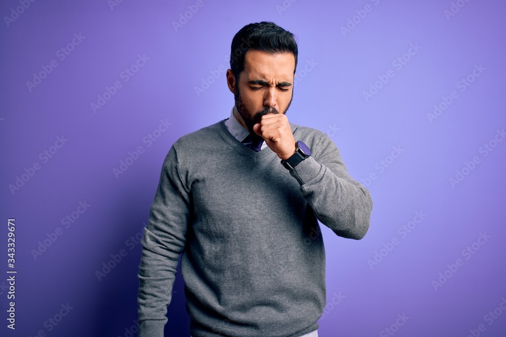 Handsome businessman with beard wearing casual tie standing over purple background feeling unwell and coughing as symptom for cold or bronchitis. Health care concept. Handsome businessman with beard wearing casual tie standing over purple background feeling unwell and coughing as symptom for cold or bronchitis. Health care concept.