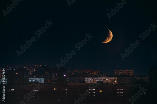 Moon under the city