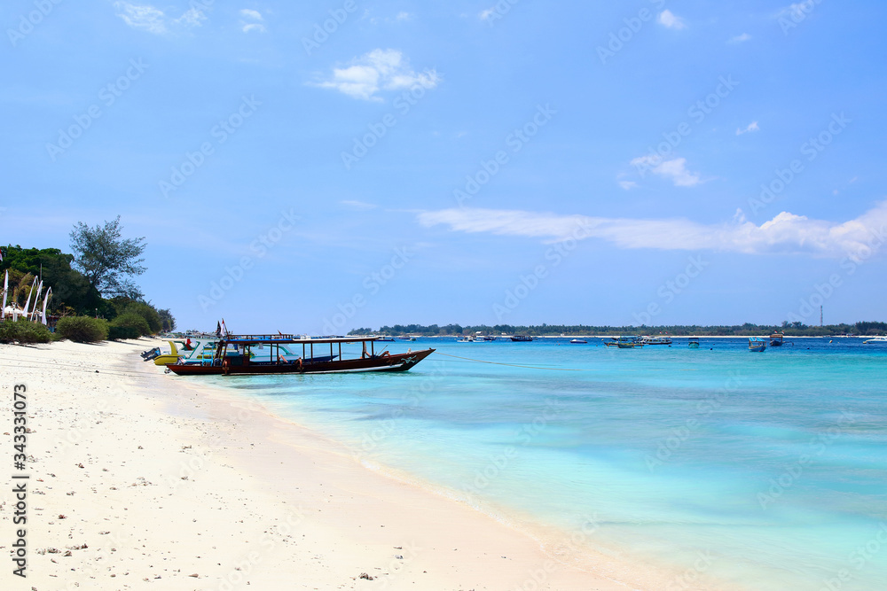 Main view of the coastline between Surf Point beach and  Harbor beach in Gili Trawangan island, on of the most impressive spots in Lombok, Indonesia.