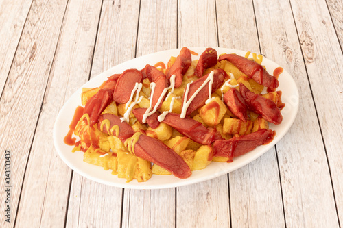 Latin American salchipapas plate photo