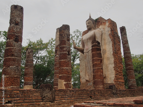 Temple,Sukhothai thailand,Is located outside the old city wall of Sukhothai in the west In the area of Aranyawat or Wat Pa, this temple is located on a hill about 200 meters photo