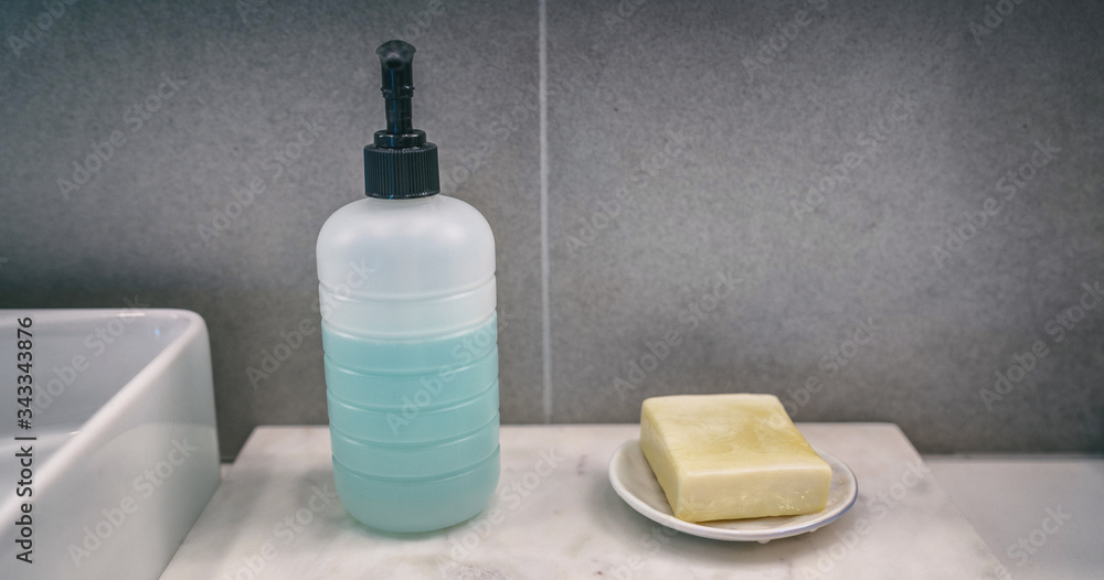 Soap bar versus liquid hand soap bottle comparison of hand washing