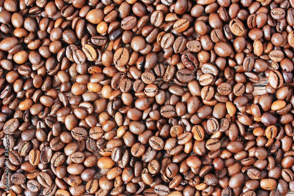 Coffee beans lie in bulk Coffee beans lie in bulk