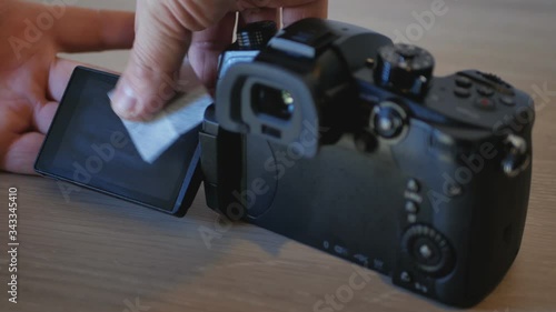 Cleaning Camera Touchscreen Display LCD Screen. 4K Close-Up Footage photo