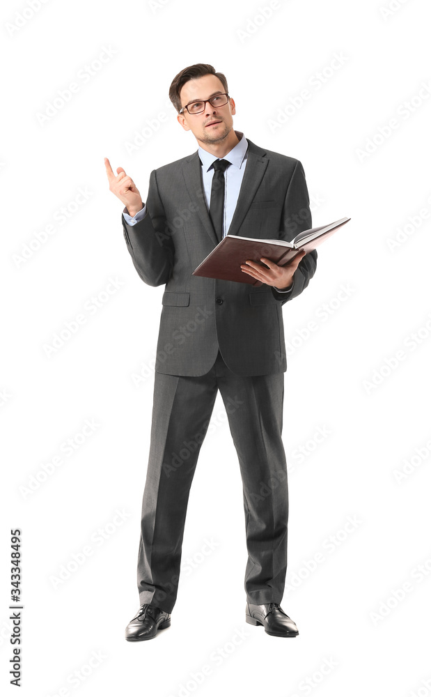 Portrait of thoughtful businessman with book on white background Portrait of thoughtful businessman with book on white background