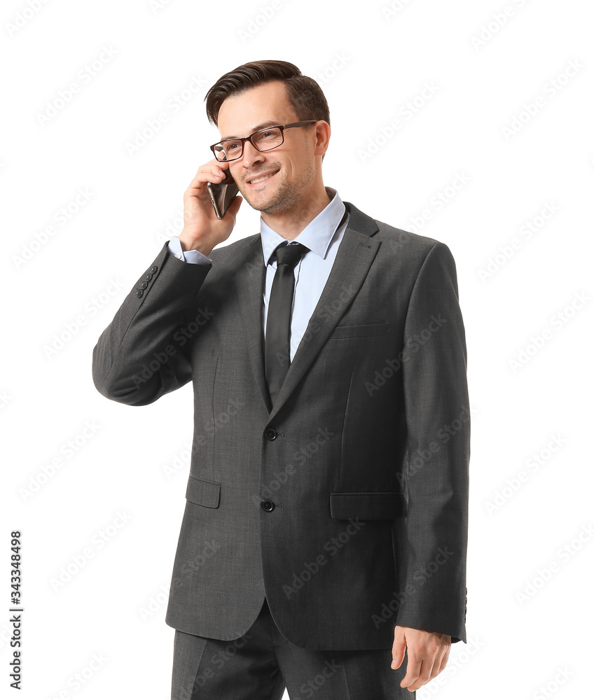 Portrait of handsome businessman talking by mobile phone on white background Portrait of handsome businessman talking by mobile phone on white background