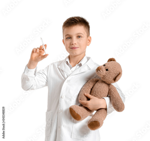 Cute little doctor with ted...
