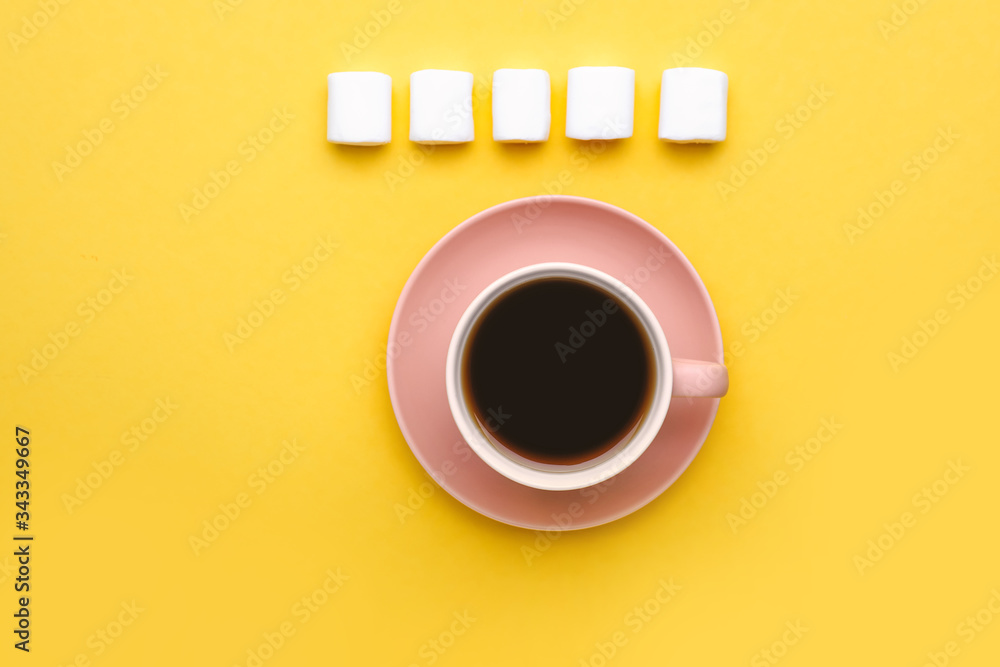 Cup of coffee with marshmallows on color background Cup of coffee with marshmallows on color background