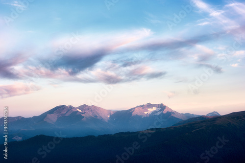 Mountain snow peaks sunset landscape. Caucasian mountains of the Republic of Adygea, Krasnodar region © ASHarchenko