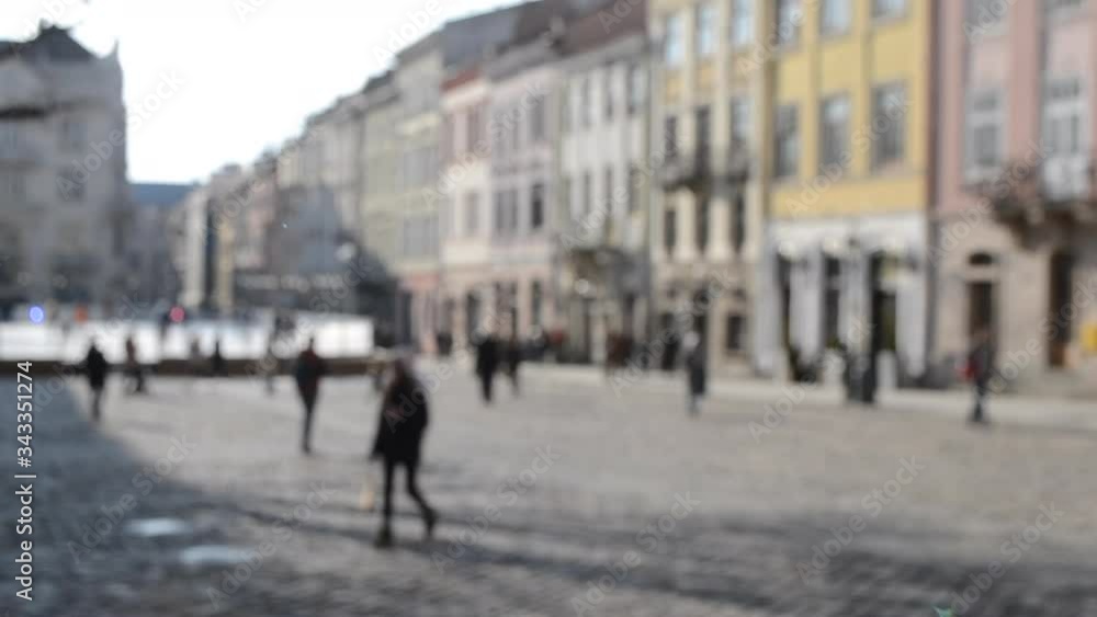 Blurred Background of many people on street square old ancient city town Blurred Background of many people on street square old ancient city town