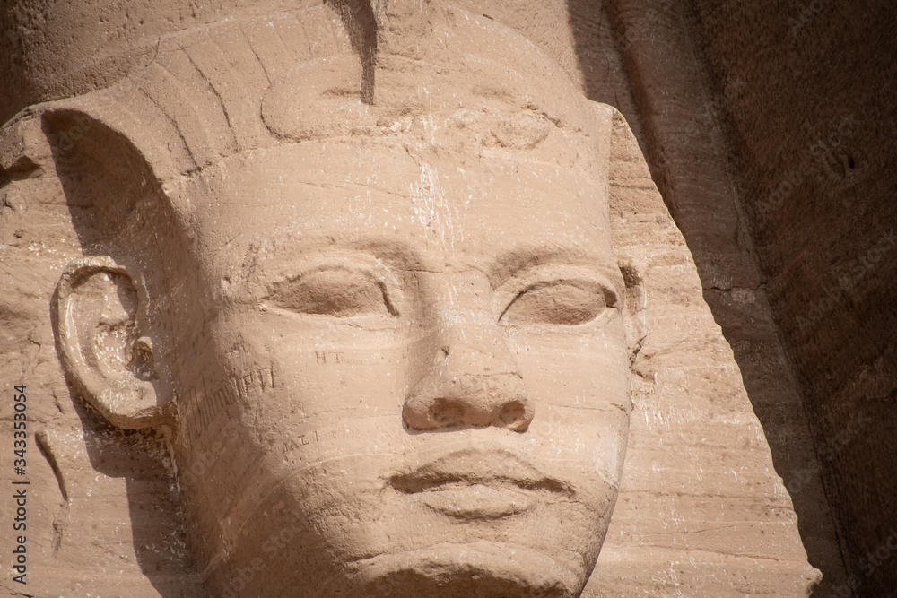 Fototapeta premium Stone statue of Ramesses II in Abu Simbel temple, Egypt