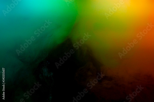 Fototapeta Naklejka Na Ścianę i Meble -  Abstract art powder paint on black background. Movement abstract frozen dust explosion multicolored on black background.