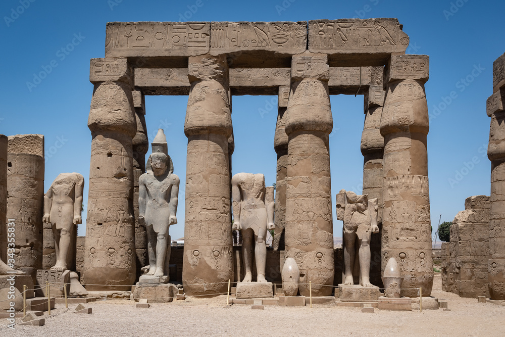 Ancient Egypt columns and gods in Luxor temple