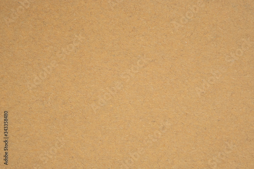 Texture of brown craft paper or kraft paper background.